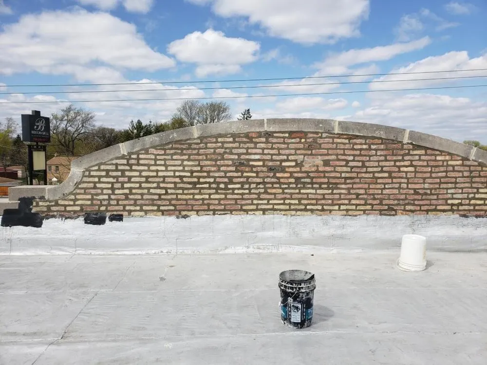 Slide of Foley Tuckpointing & Roofing