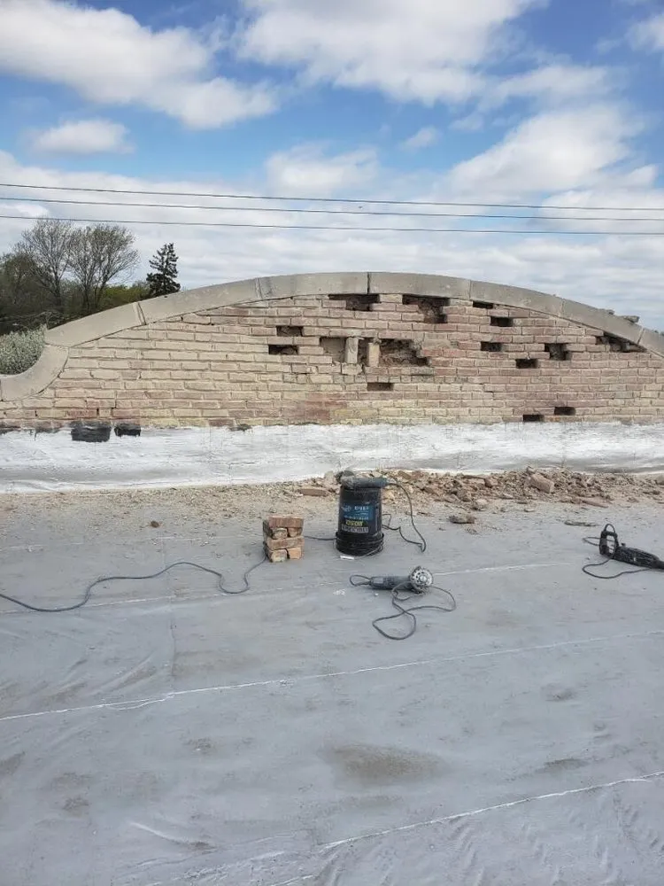 Slide of Foley Tuckpointing & Roofing