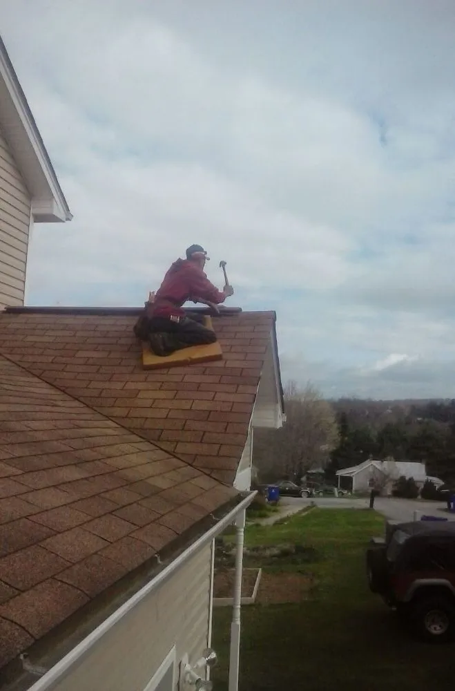 Slide of Fonzie's Roofing