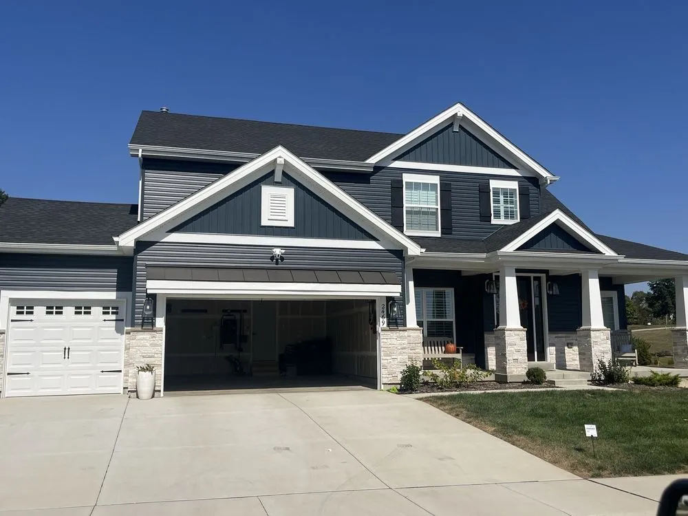 Professional shingle roofing service after storm damage in St. Louis, MO by For Valor Roofing