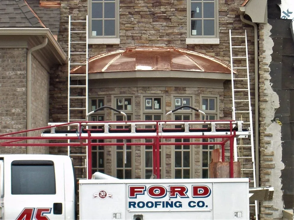 Slide of Ford Roofing Company