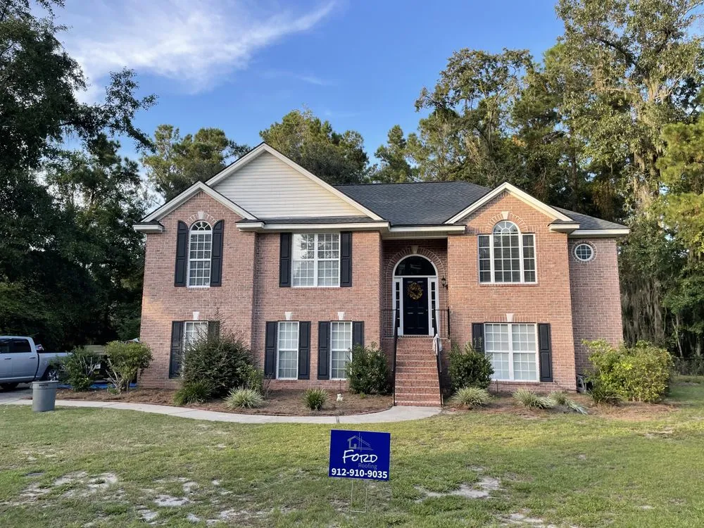 Slide of Ford Roofing