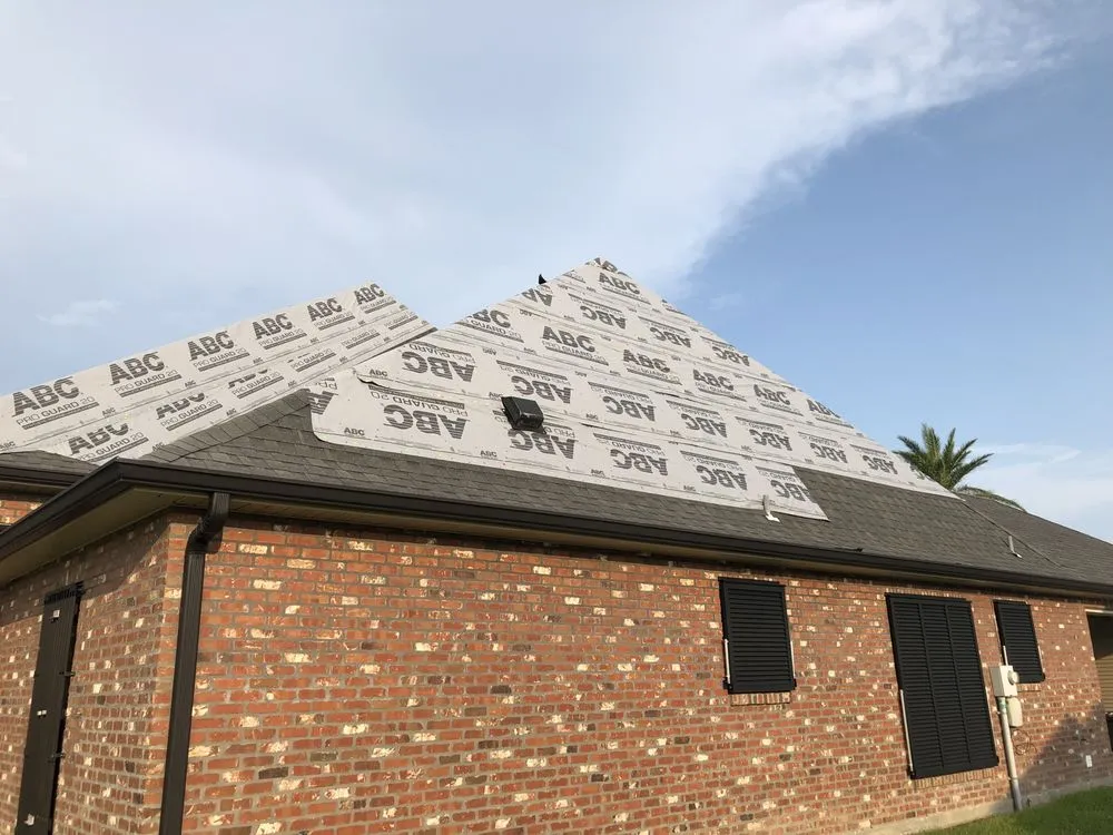 Slide of Ford Roofing Service