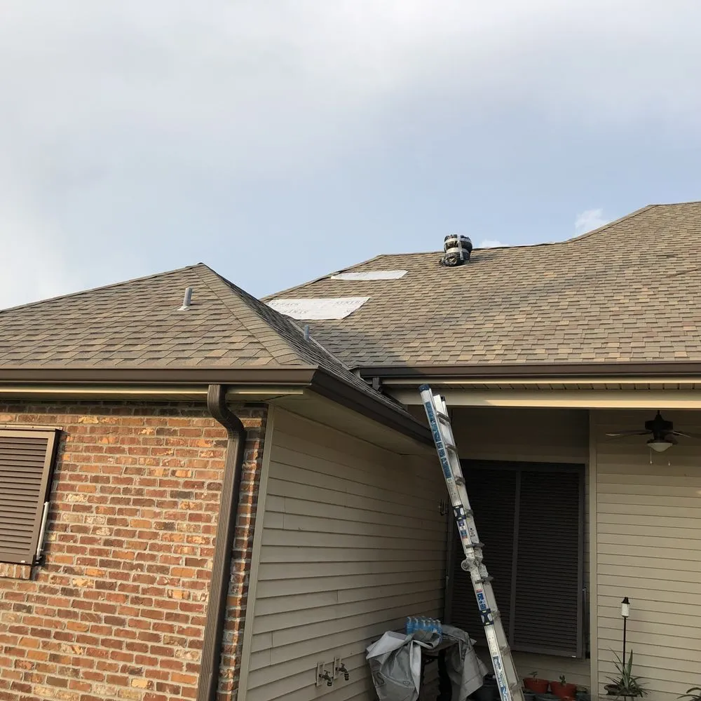 Slide of Ford Roofing Service