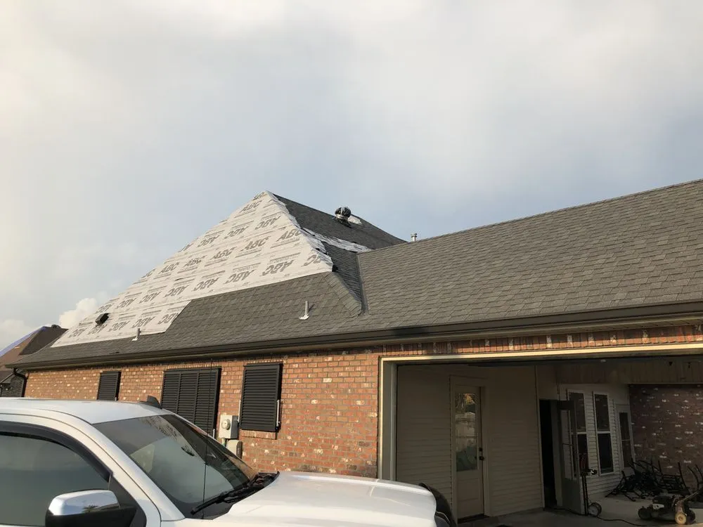 Slide of Ford Roofing Service