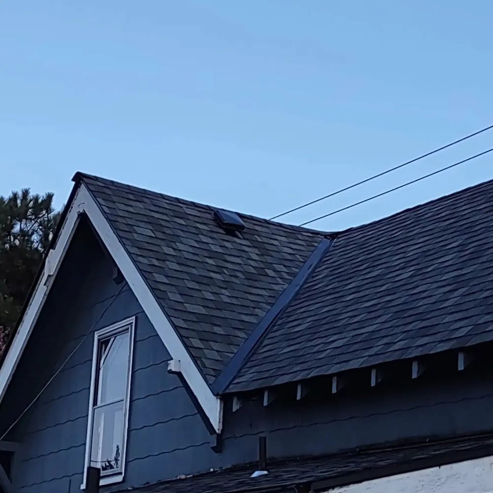 Slide of Forever Roofing