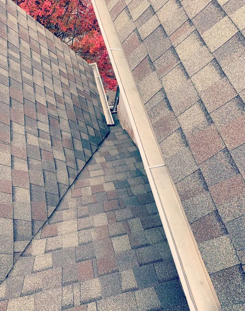 Slide of Fort Logan Roofing