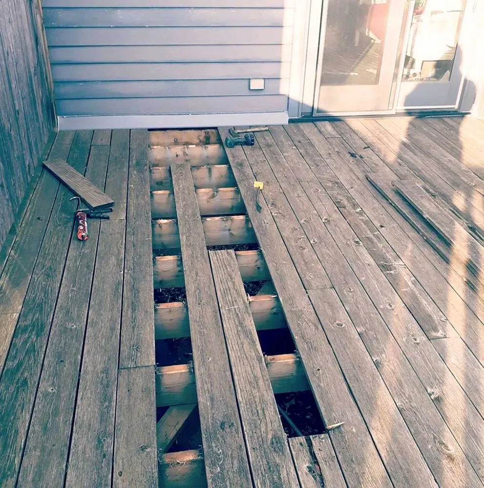 Slide of Fort Logan Roofing