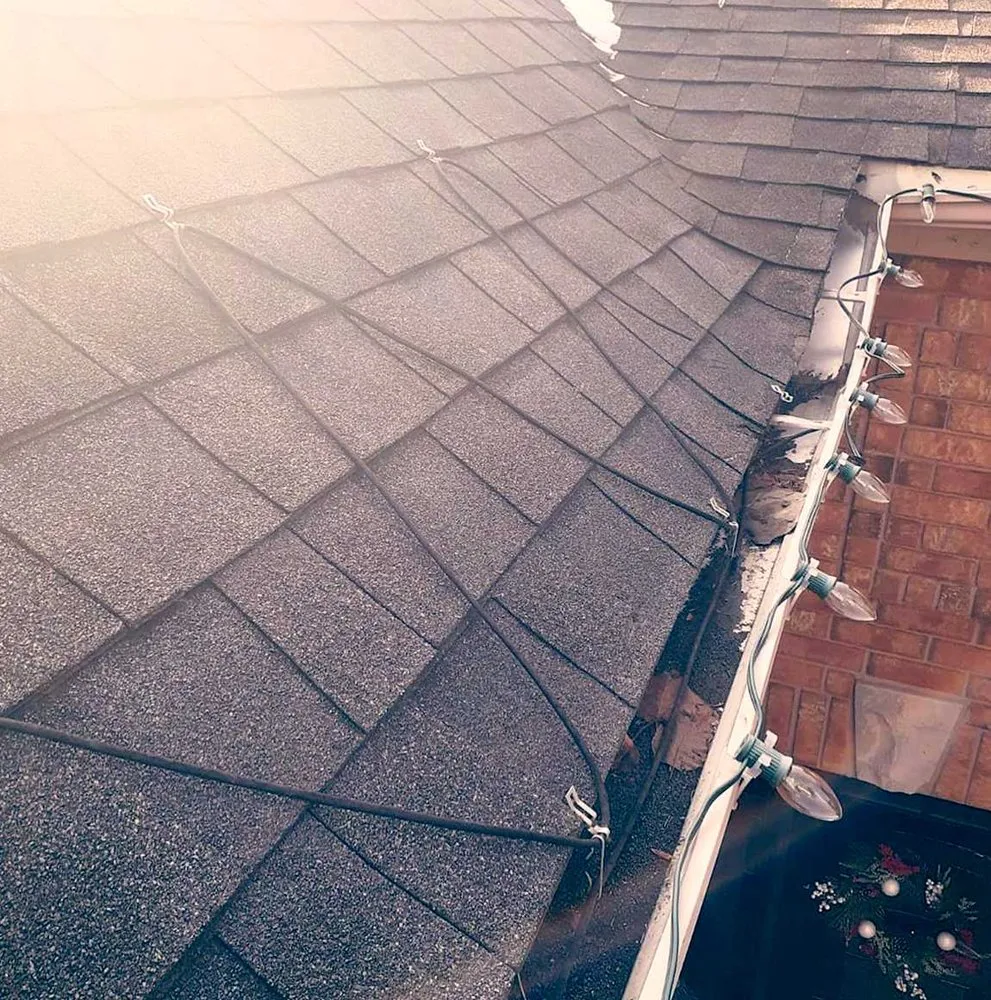 Slide of Fort Logan Roofing