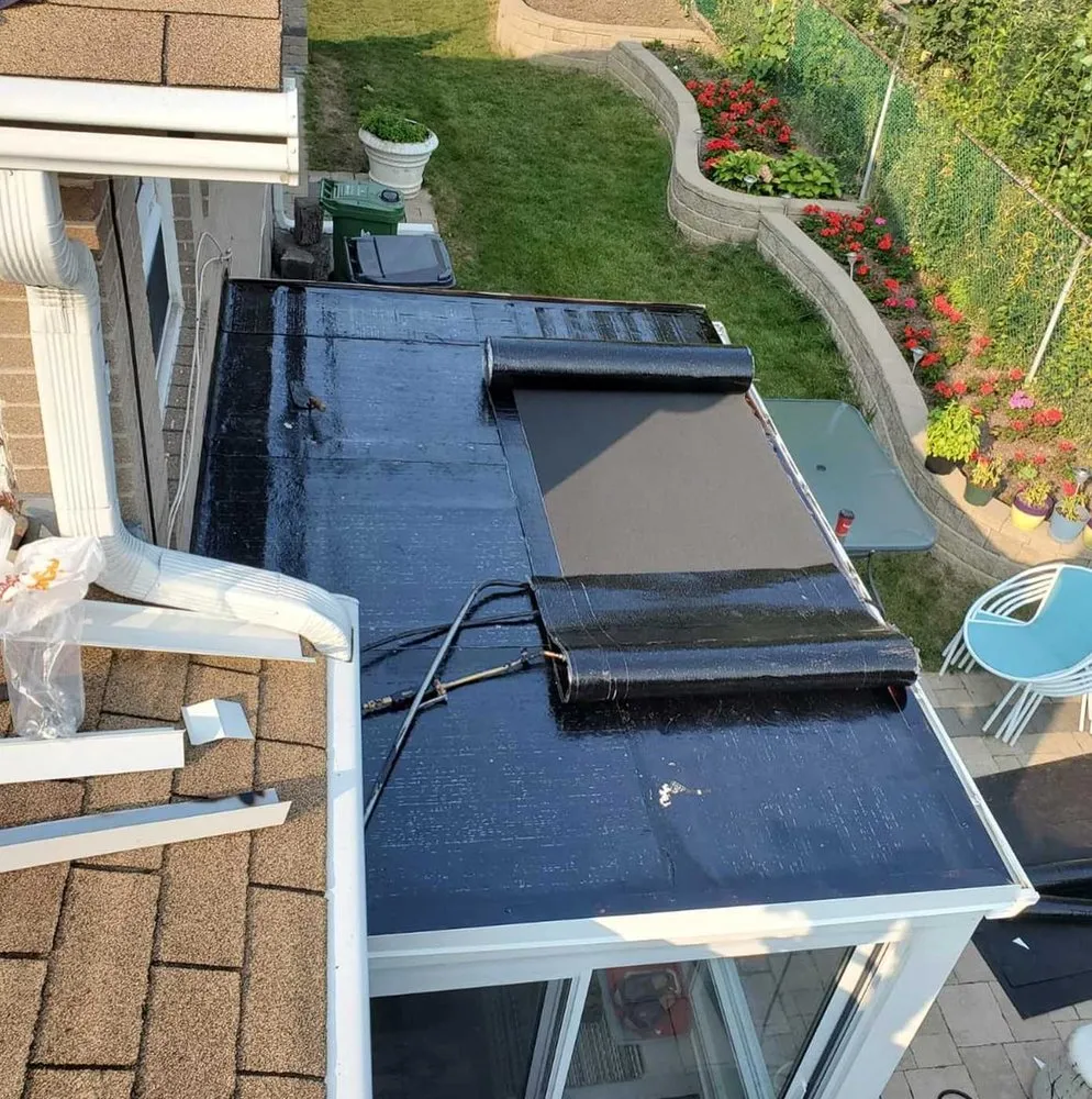 Slide of Fort Logan Roofing