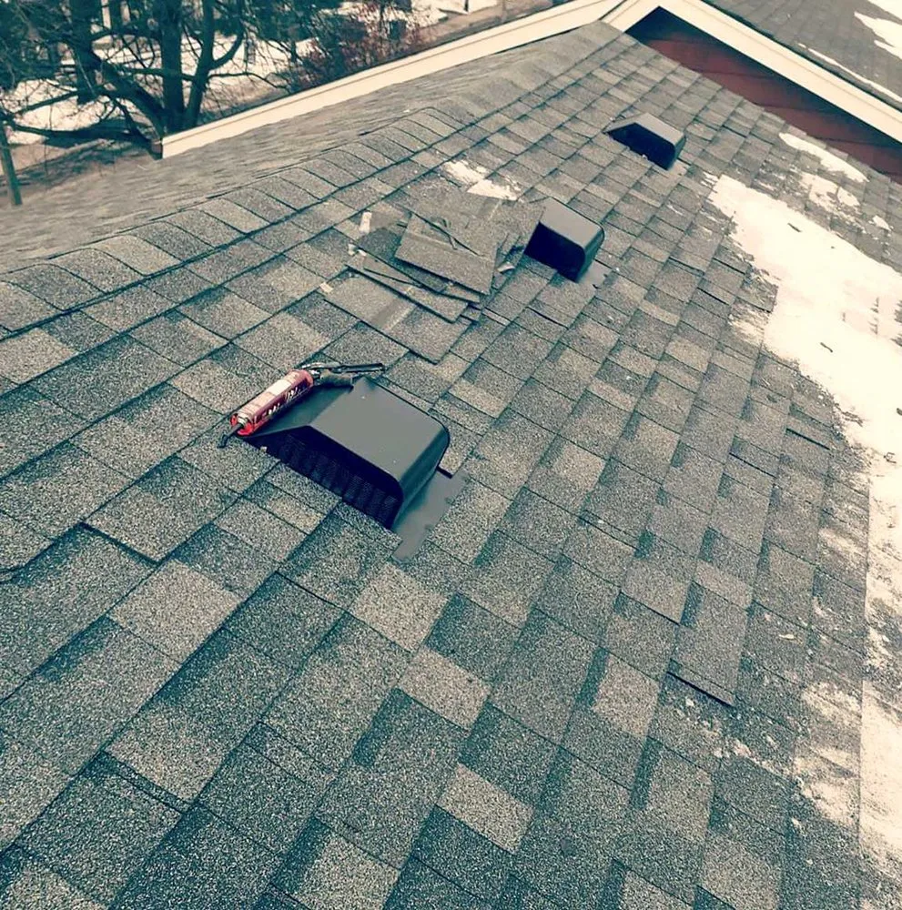 Slide of Fort Logan Roofing