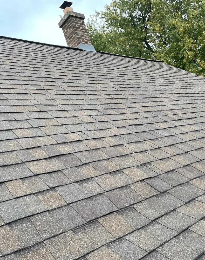 Slide of Fort Logan Roofing