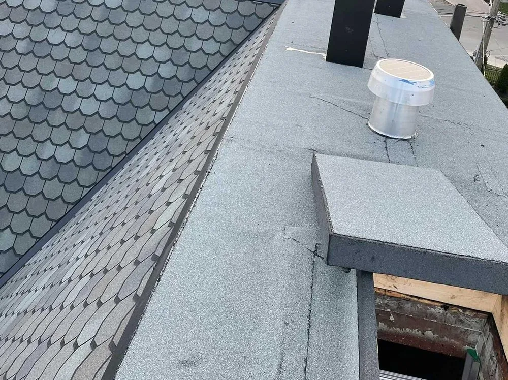 Slide of Fort Logan Roofing