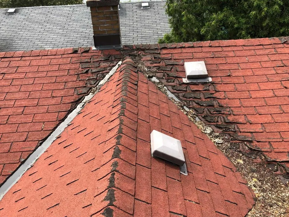 Slide of Fort Logan Roofing