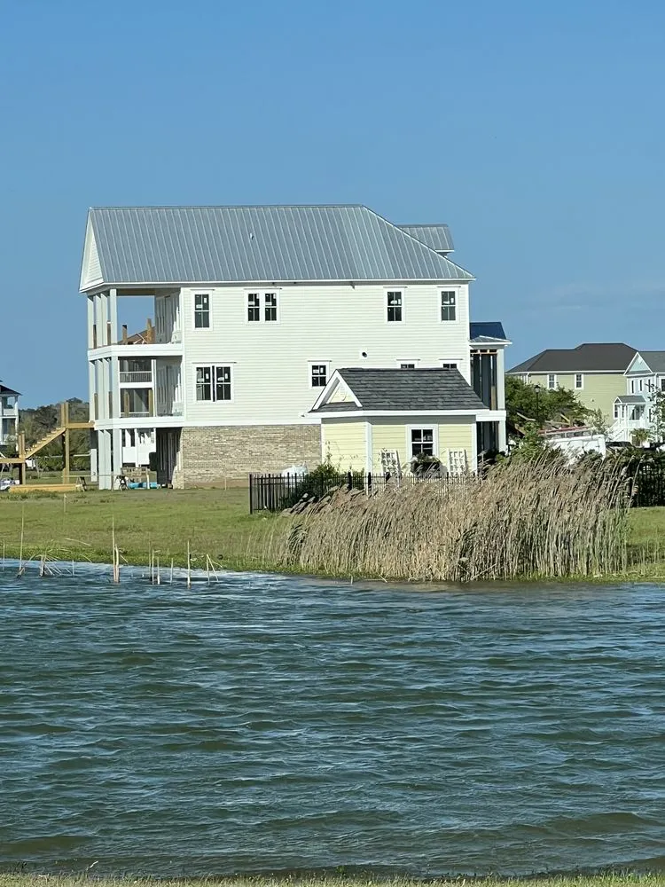 Slide of Fortitude Roofing Company