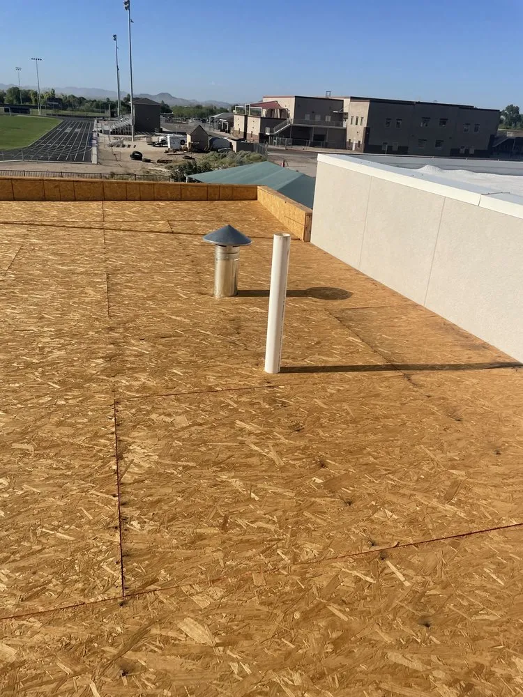 Slide of Four A's Roofing Contractor