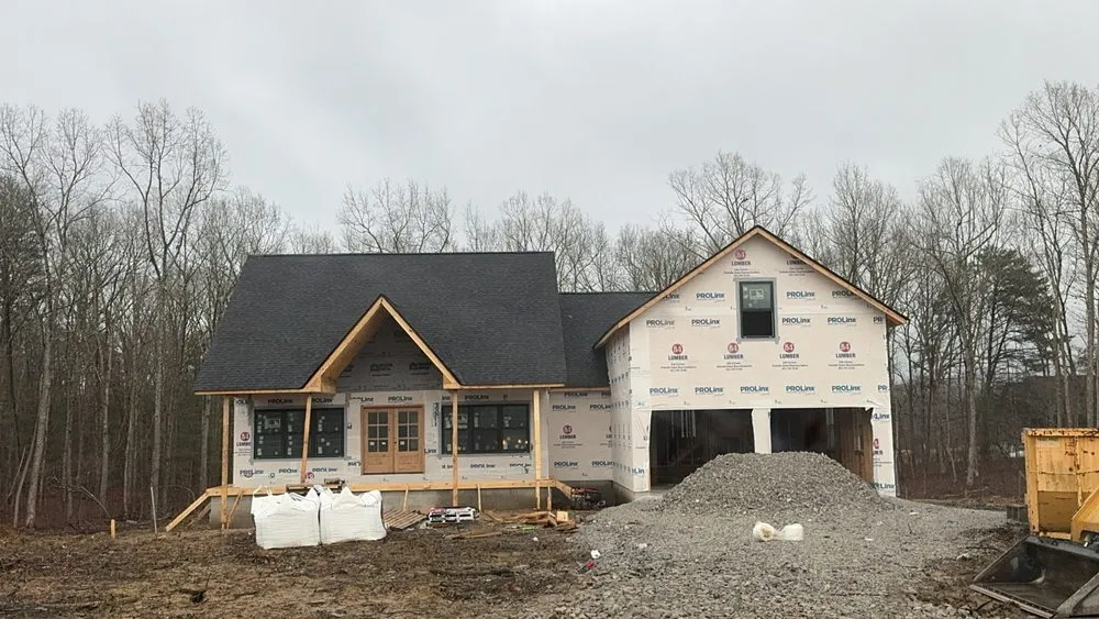 Slide of Four Bridges Roofing