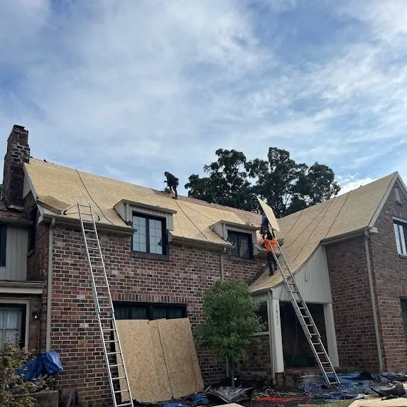 Slide of Four Bridges Roofing