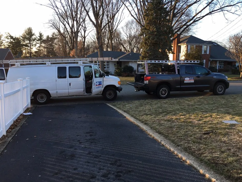Slide of Four Brothers Roofing