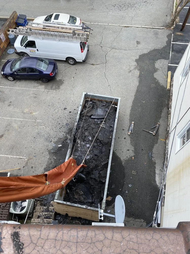 Slide of Four Brothers Roofing