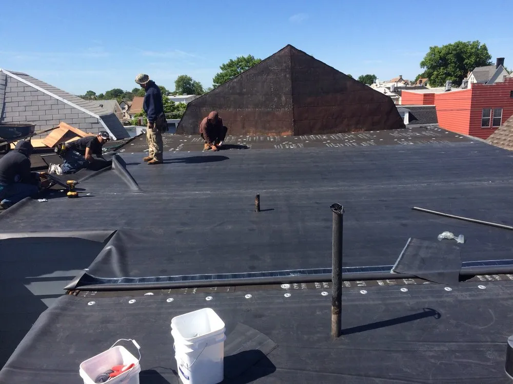 Slide of Four Brothers Roofing