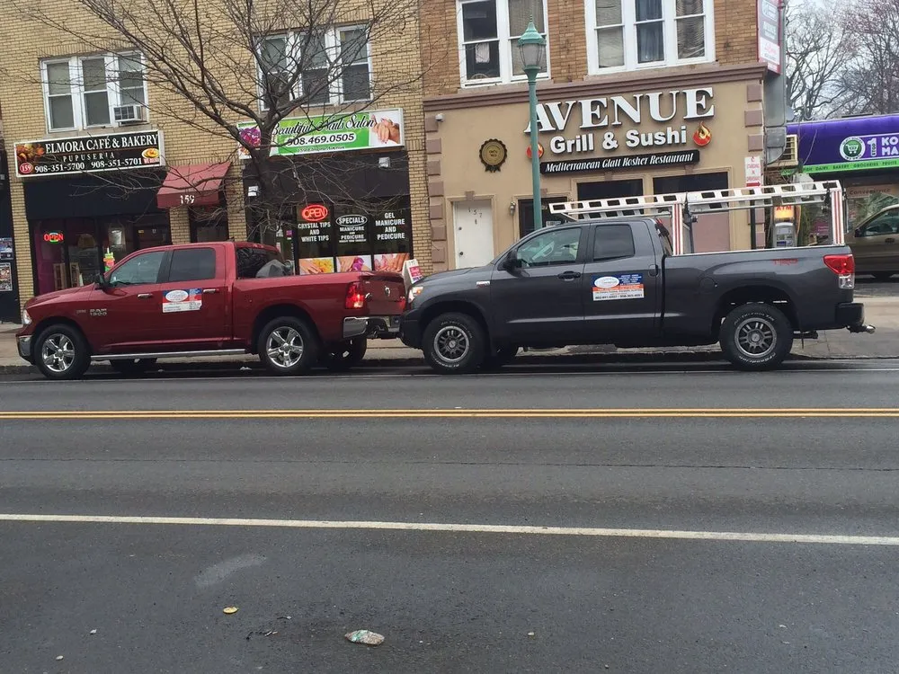 Slide of Four Brothers Roofing
