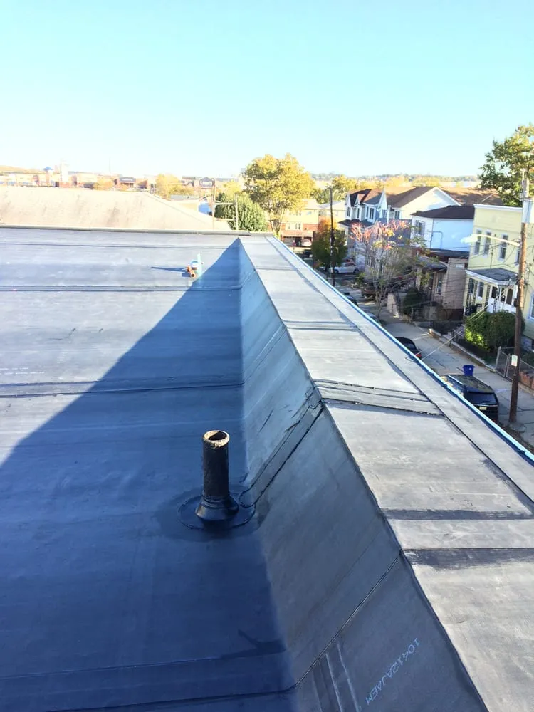 Slide of Four Brothers Roofing