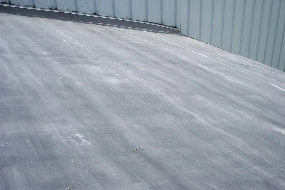 Slide of Four Decades Roofing