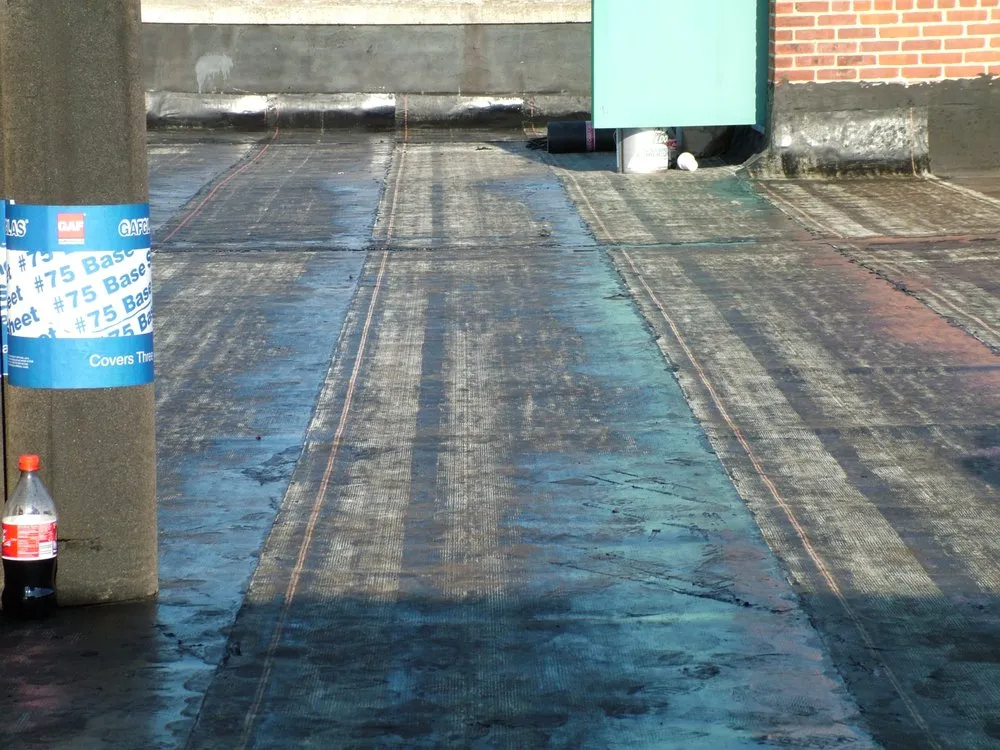 Slide of Four Decades Roofing