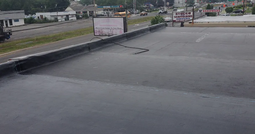 Slide of Four Decades Roofing