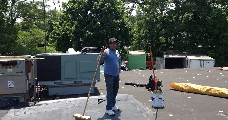 Slide of Four Decades Roofing