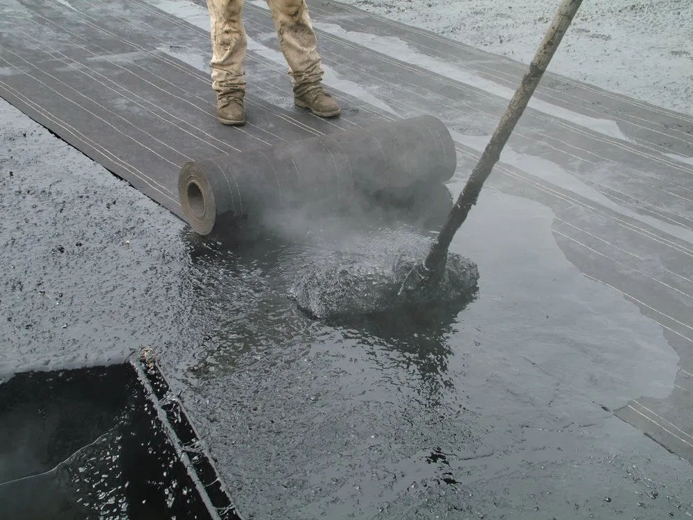 Slide of Four Decades Roofing