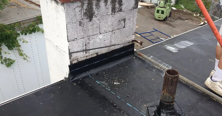 Slide of Four Decades Roofing