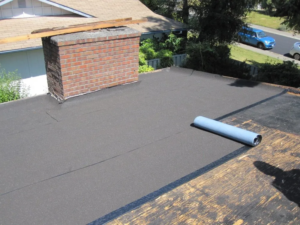 Slide of Four Decades Roofing