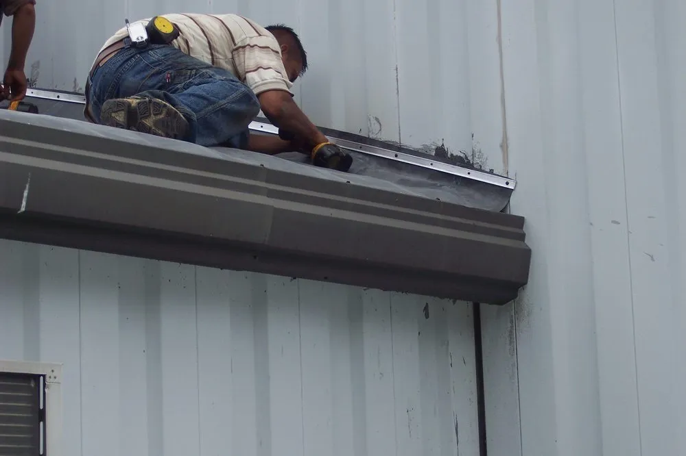 Slide of Four Decades Roofing