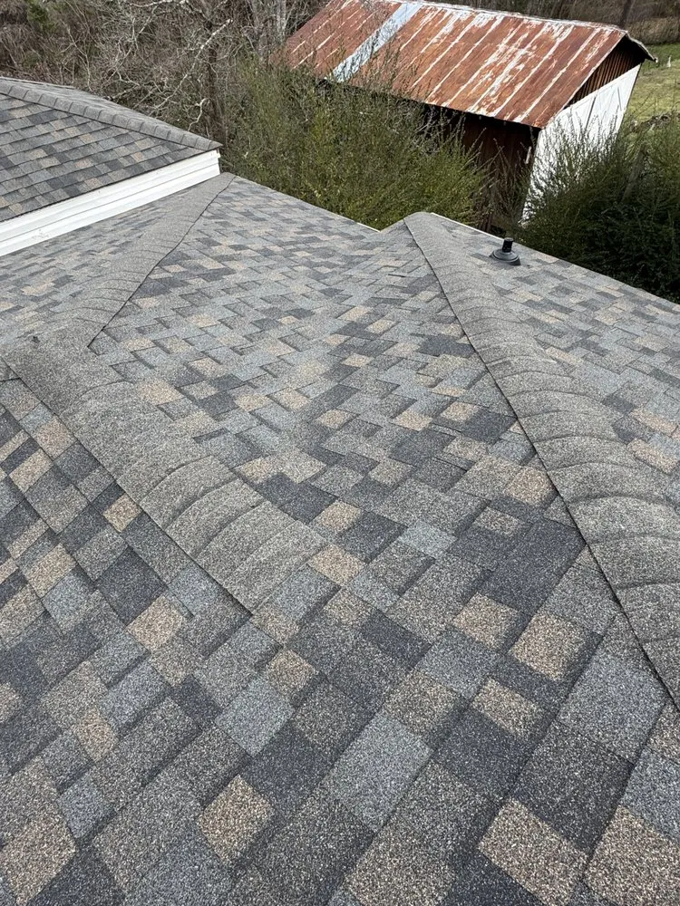 Slide of Four Families Roofing