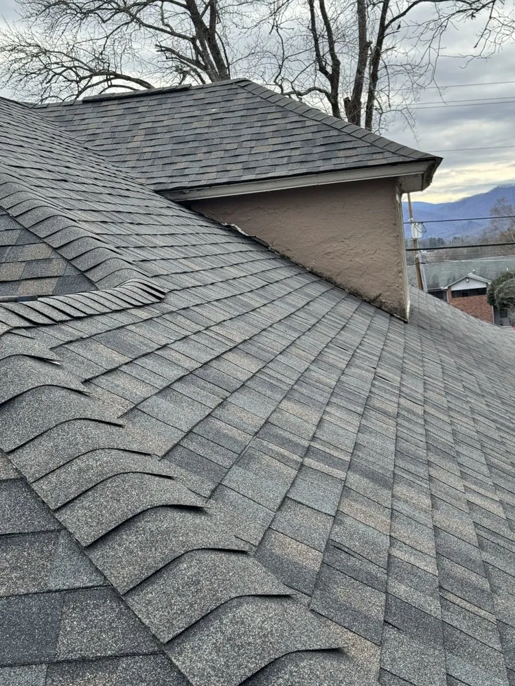 Slide of Four Families Roofing