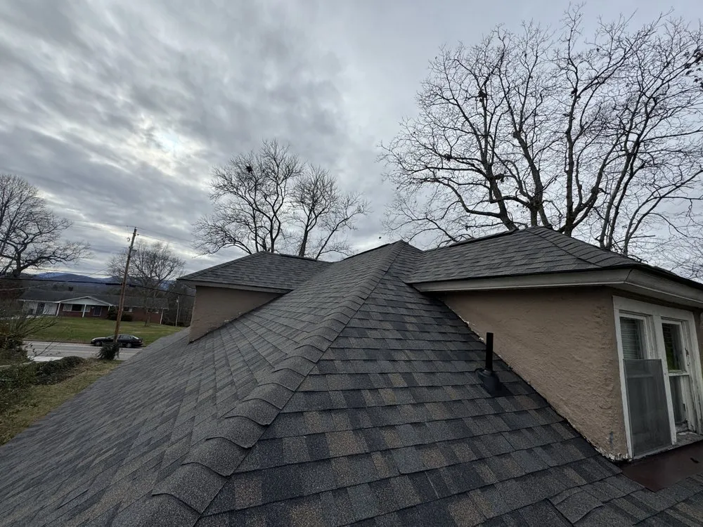 Slide of Four Families Roofing
