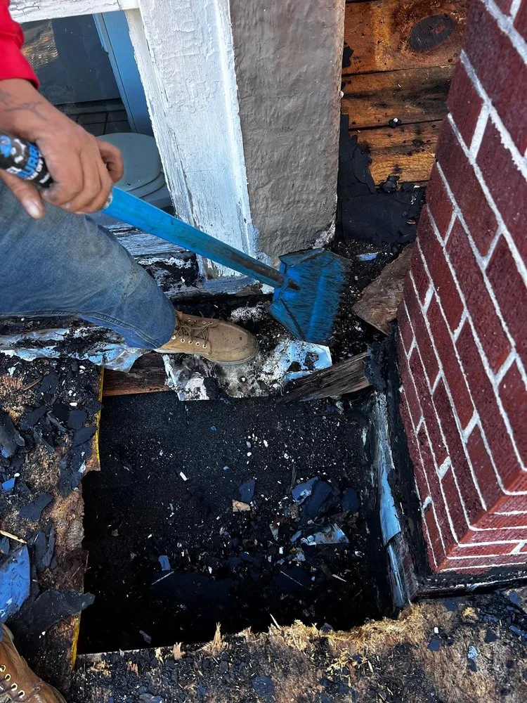 Slide of Four Families Roofing