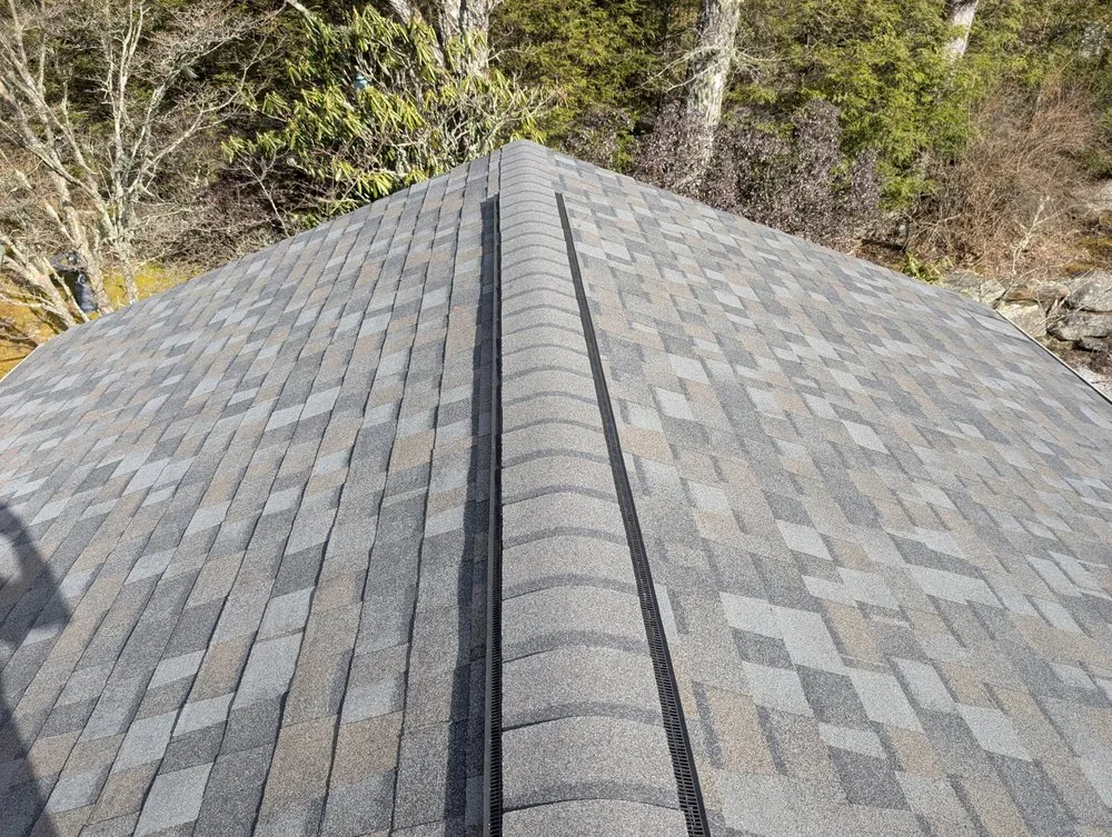 Slide of Four Families Roofing