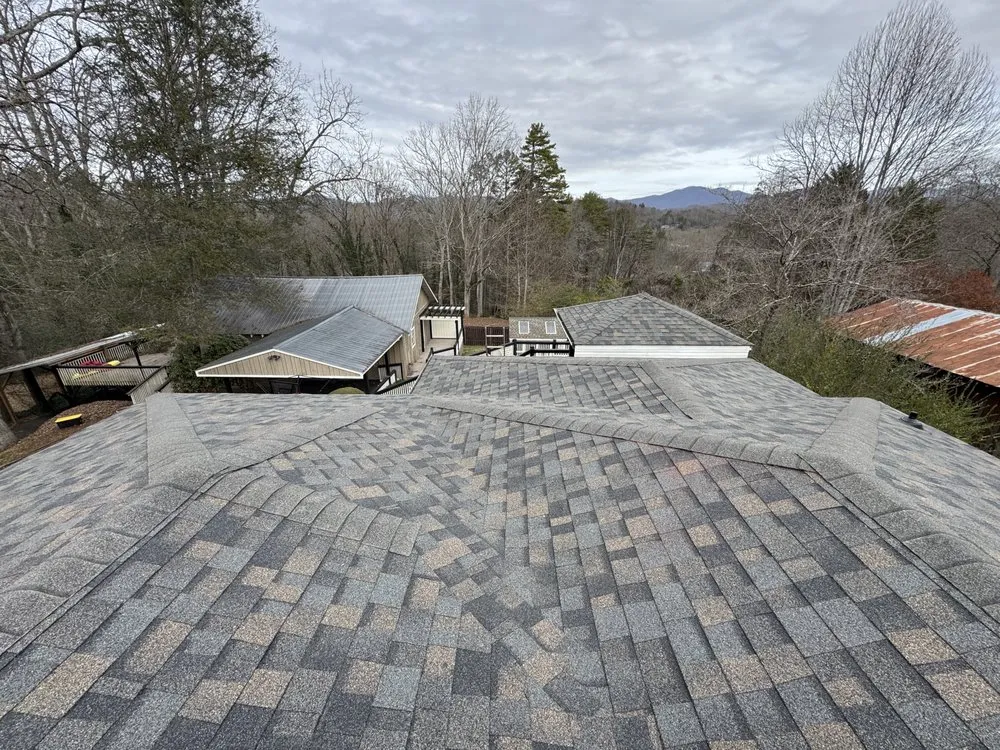 Slide of Four Families Roofing