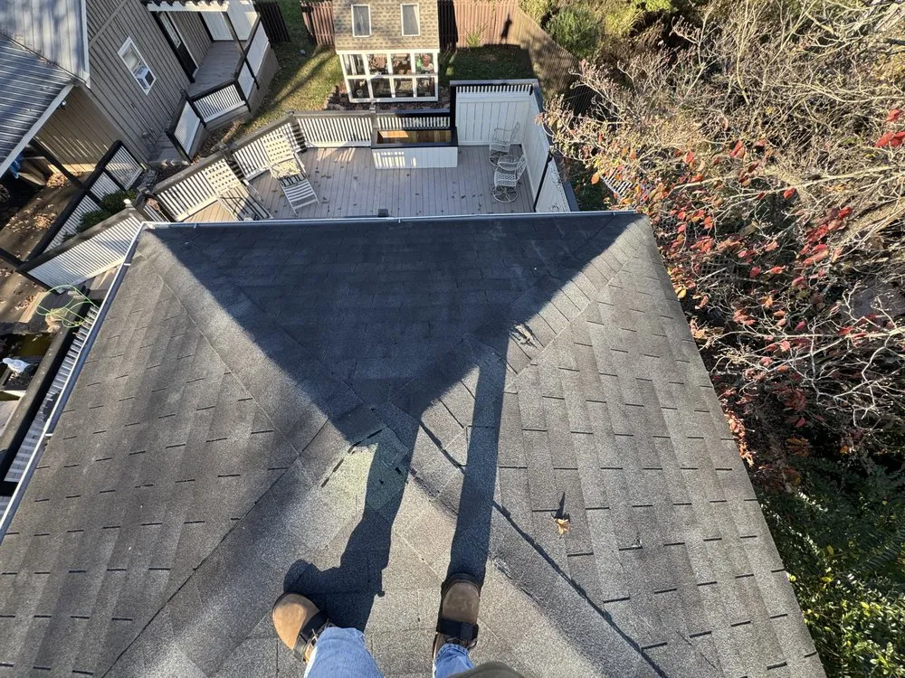 Slide of Four Families Roofing