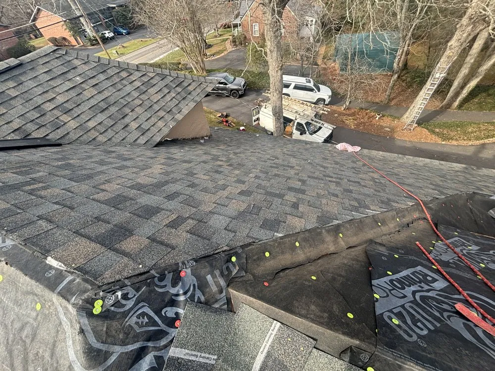 Slide of Four Families Roofing