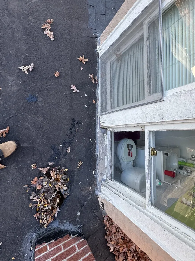 Slide of Four Families Roofing