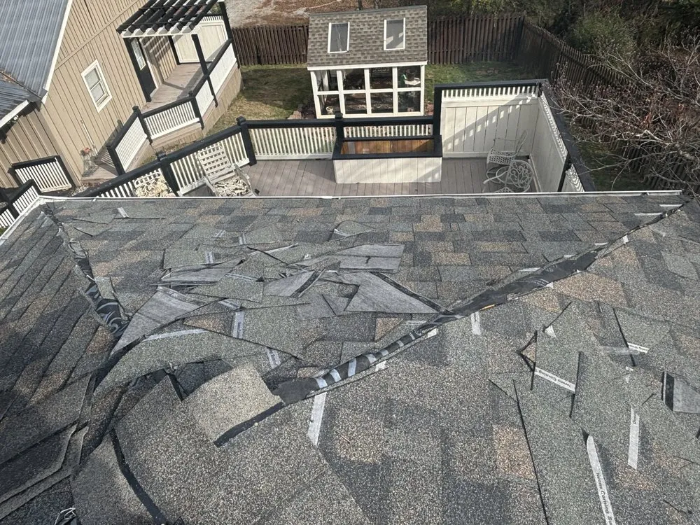 Slide of Four Families Roofing