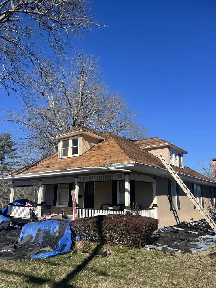 Slide of Four Families Roofing