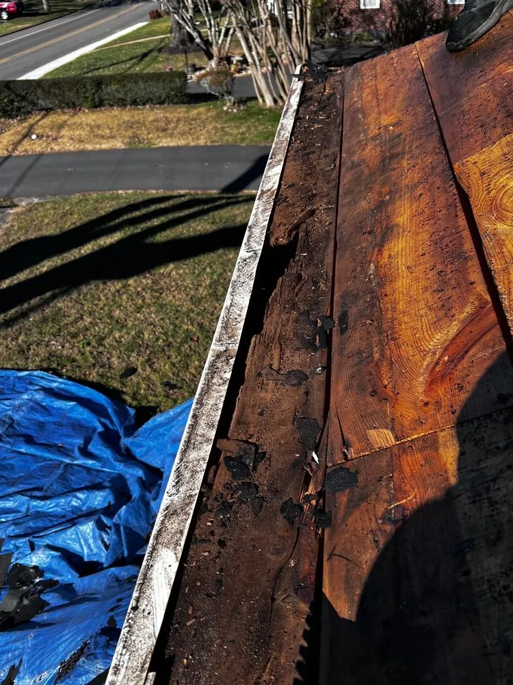 Slide of Four Families Roofing