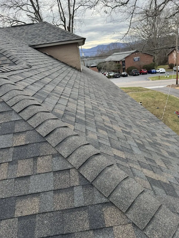 Slide of Four Families Roofing