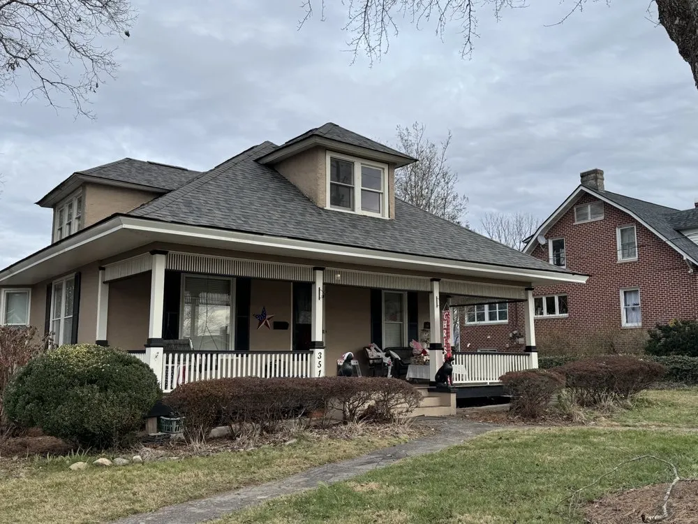 Slide of Four Families Roofing