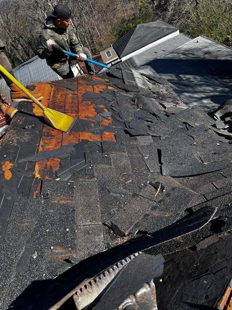 Slide of Four Families Roofing